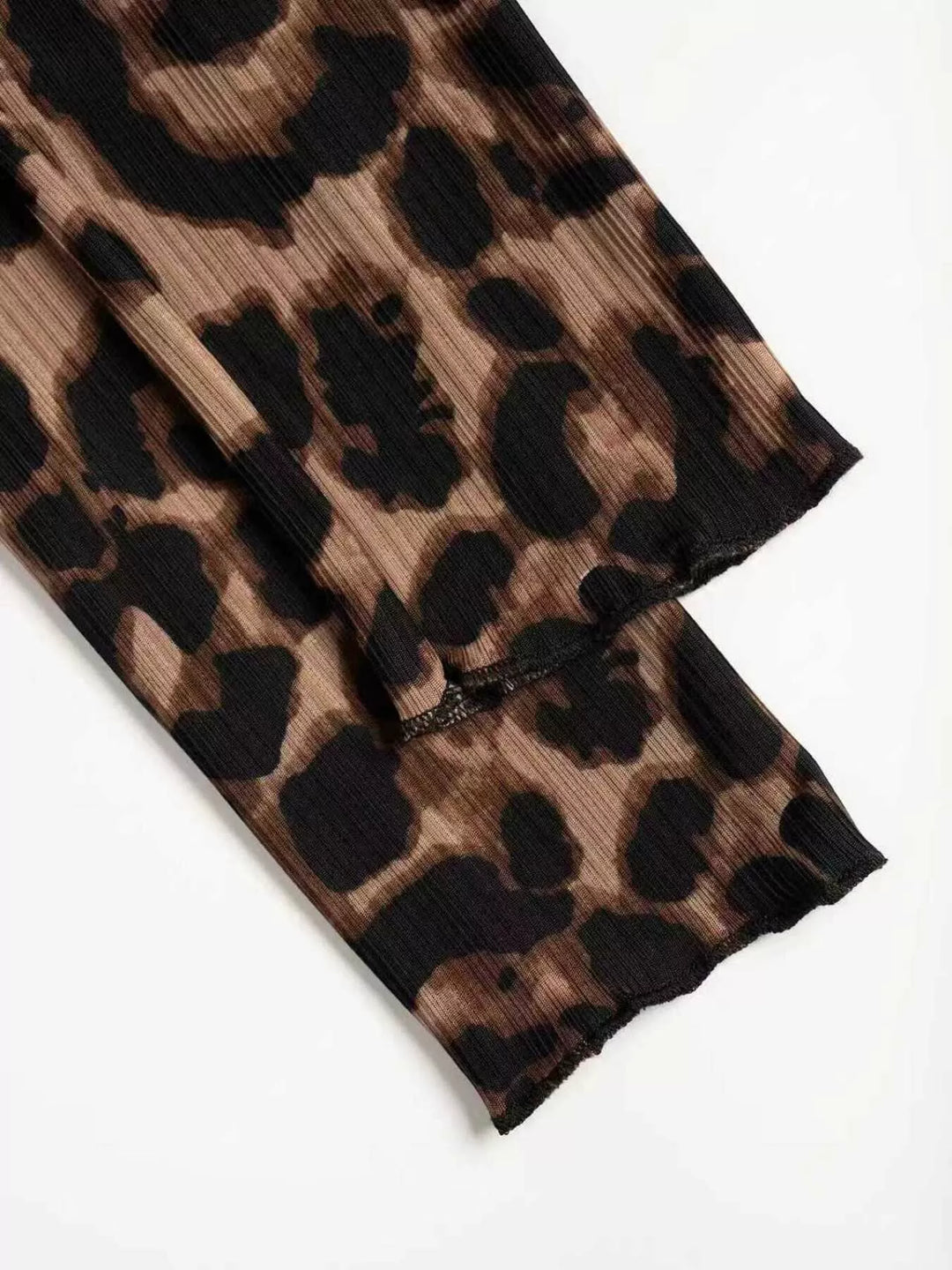 Ribbed leopard print button-up top with long sleeves