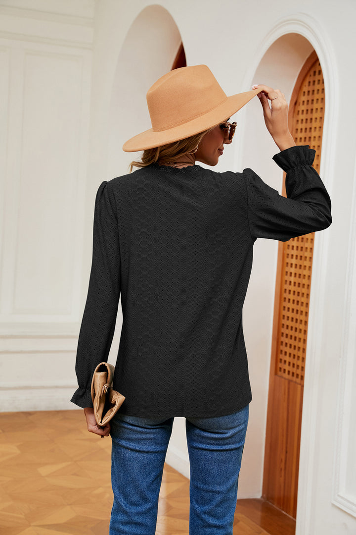 Eyelet V-neck blouse with flounce sleeves and lace trim