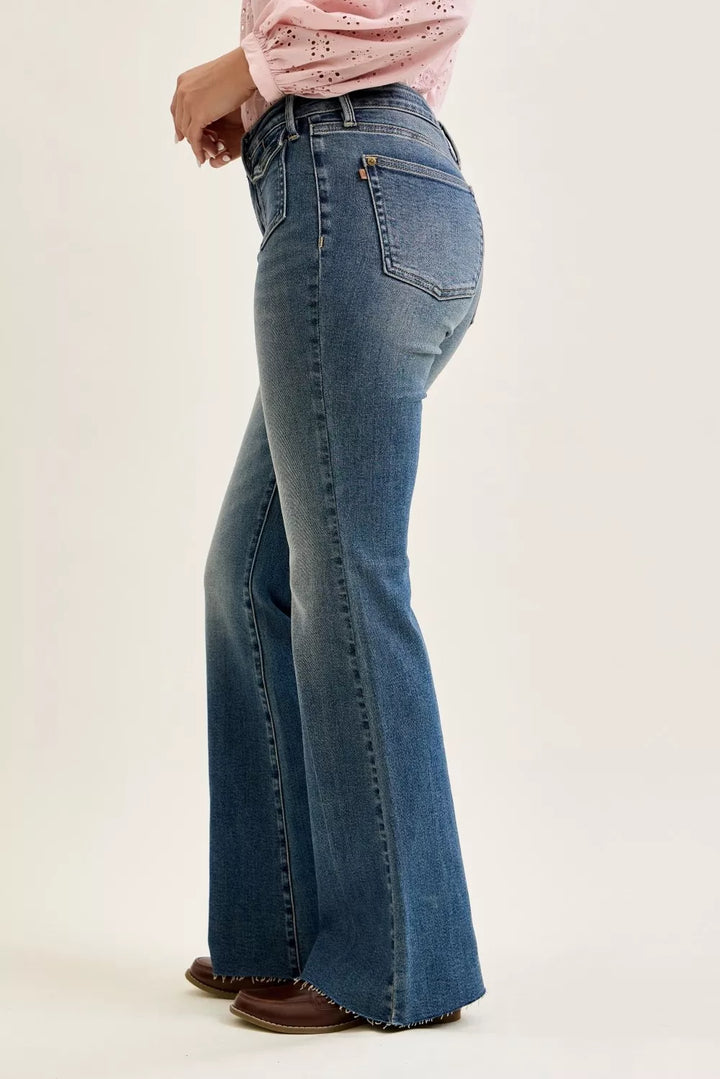 Judy Blue mid-rise flare jeans with front flap pockets and raw hem