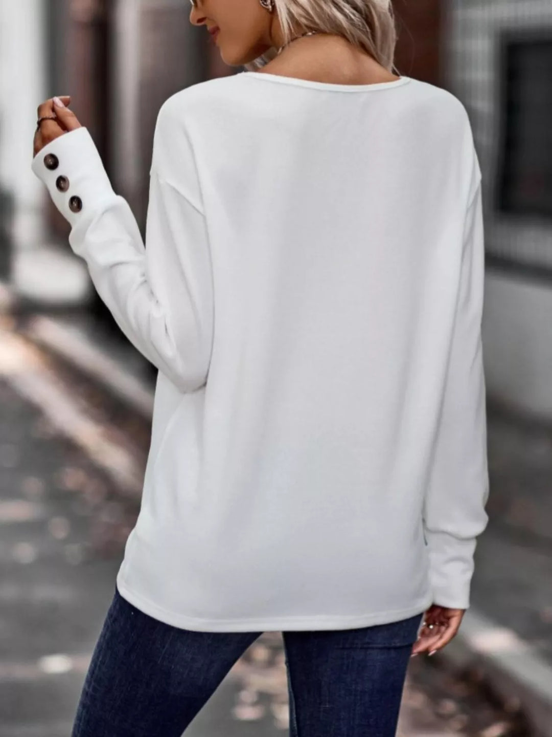V-neck long sleeve top with button cuffs