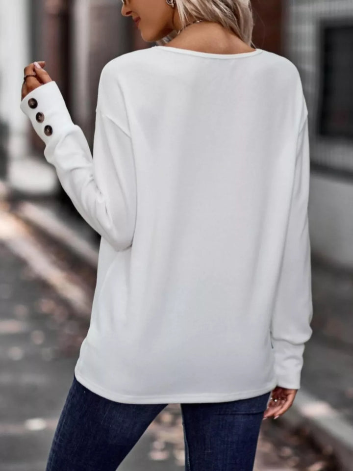 V-neck long sleeve top with button cuffs