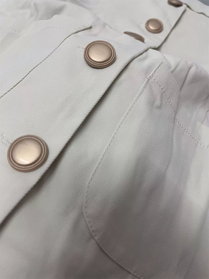 Button-down sleeveless vest with gold dome buttons and patch pockets