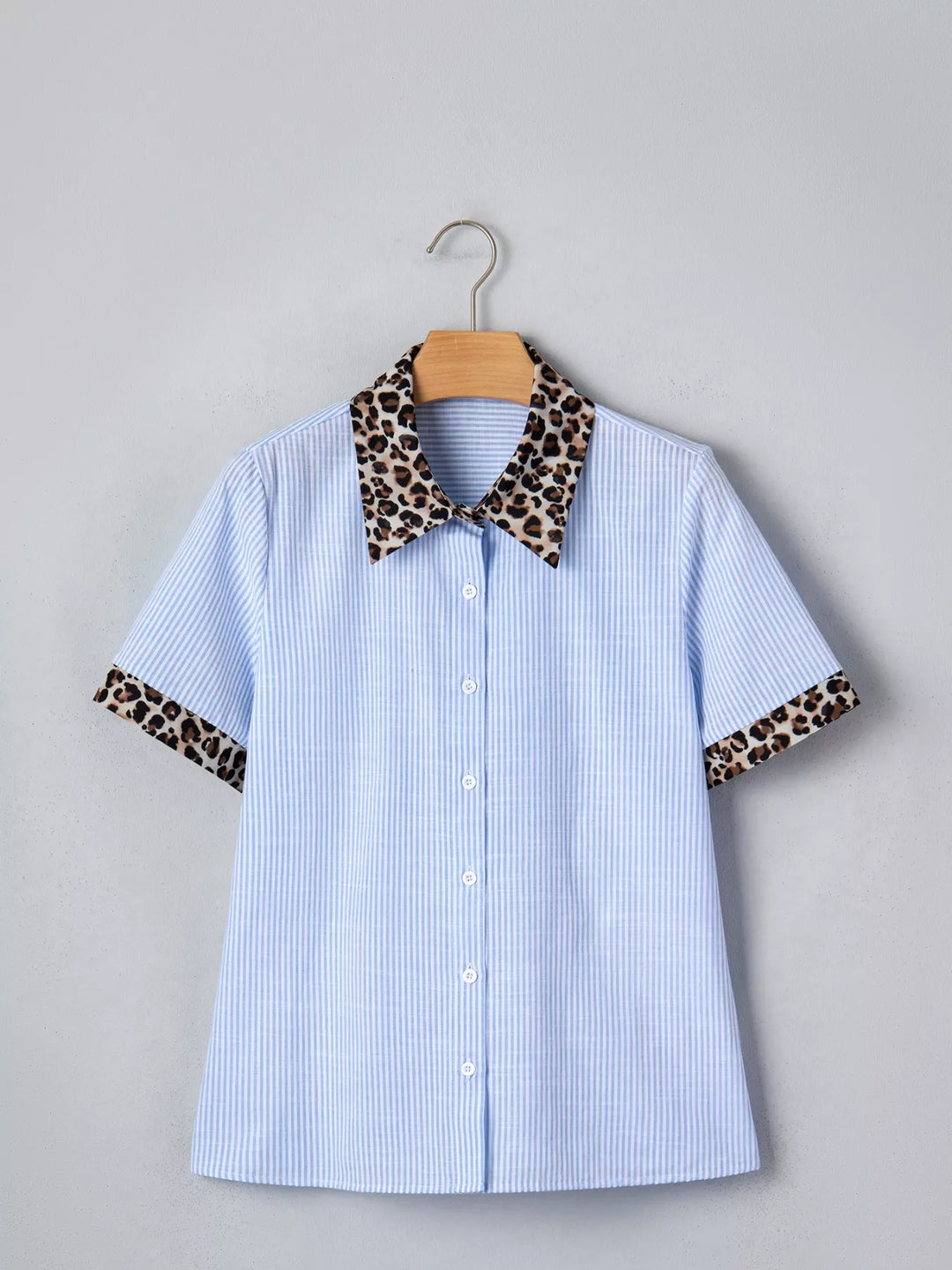 Striped short-sleeve button-down with leopard collar and cuffs