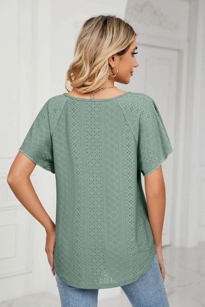 Eyelet flutter sleeve top with V-neck tie