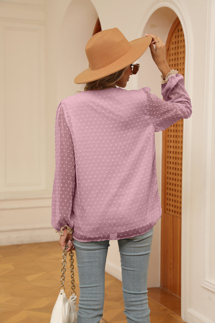 Swiss dot V-neck blouse with crochet lace trim and cuffs