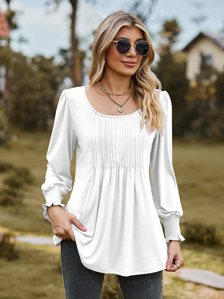White Pintuck pleated puff sleeve blouse with smocked cuffs