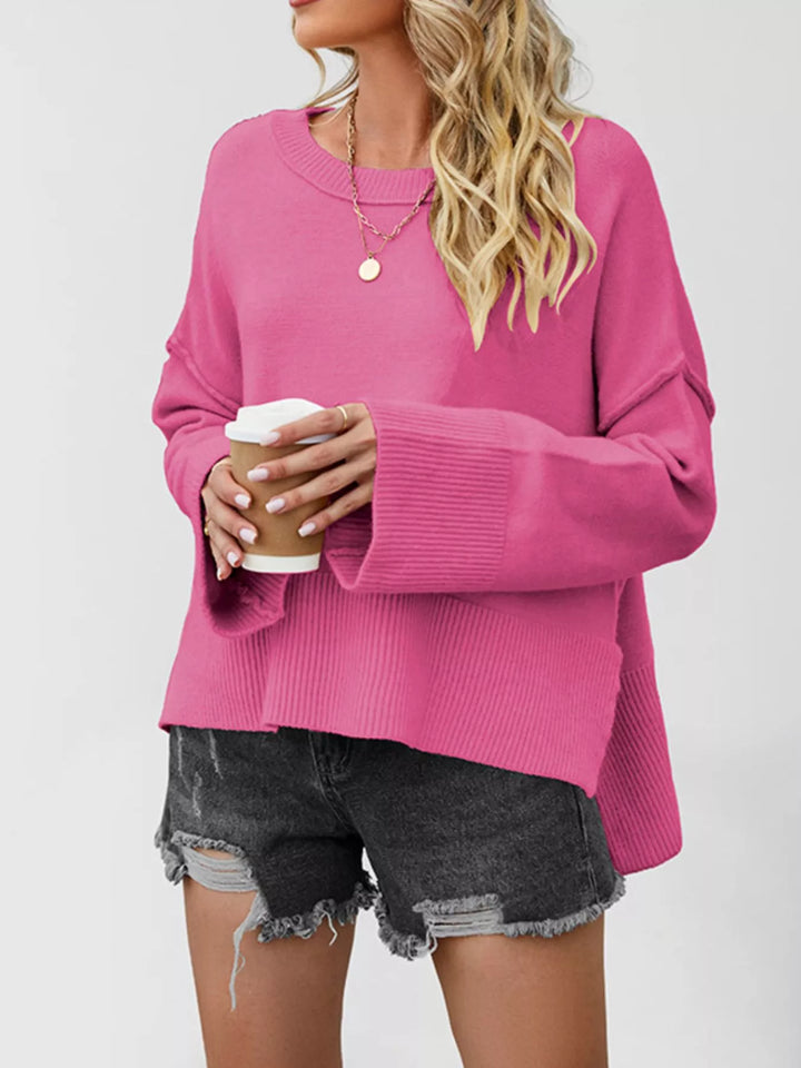 Dropped shoulder flare sleeve sweater with ribbed hem and side slits