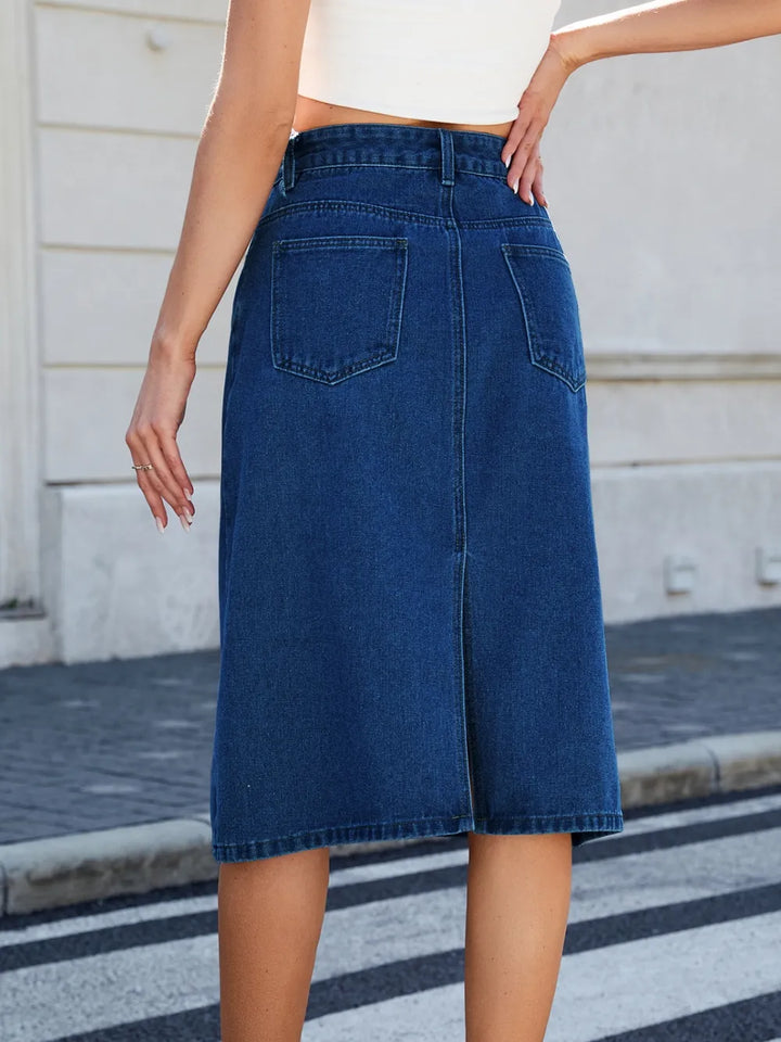 High-rise midi denim skirt with back slit and front pockets
