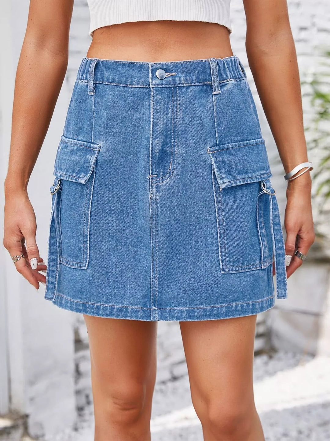 Dusty Blue Cargo denim mini skirt with flap pockets and D-rings