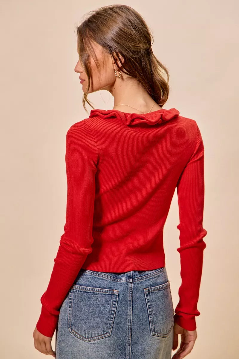 Ribbed knit cardigan with cascade ruffle trim