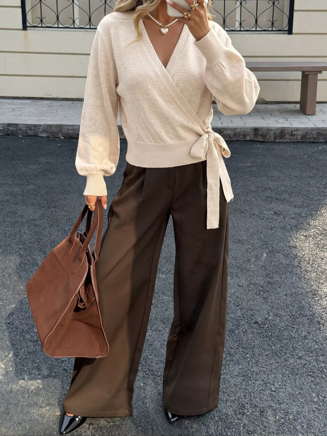 Surplice wrap sweater with side tie and drop shoulders