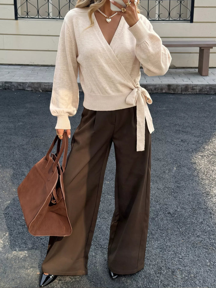 Surplice wrap sweater with side tie and drop shoulders