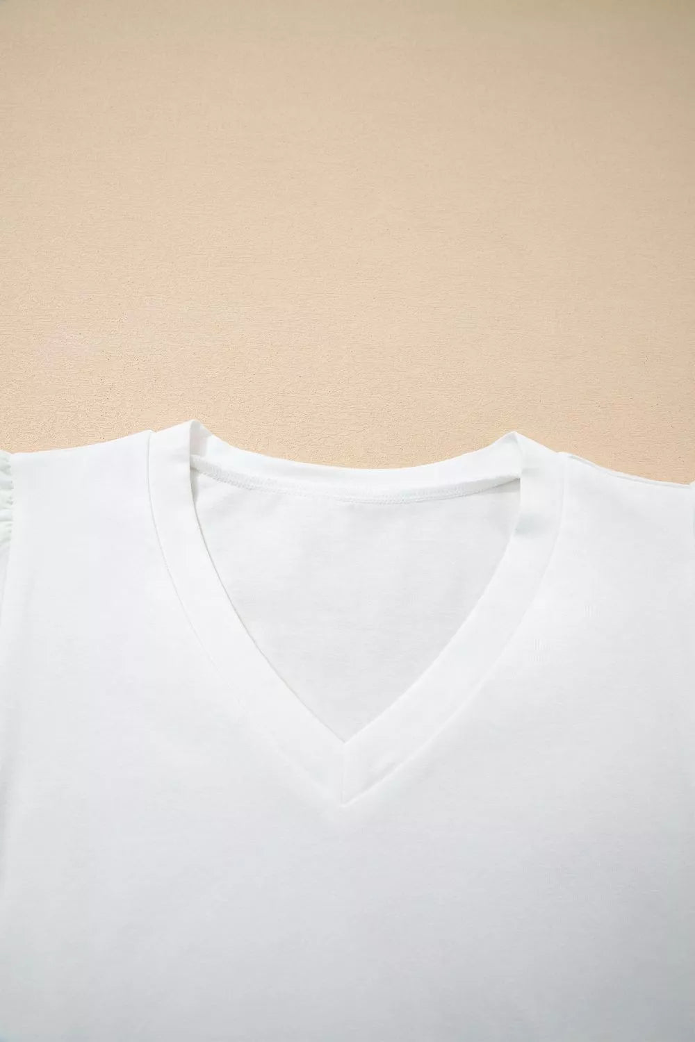 V-neck tee with eyelet embroidered flutter sleeves