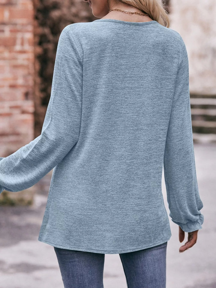 Ruffle cuff long sleeve top with pleated neckline
