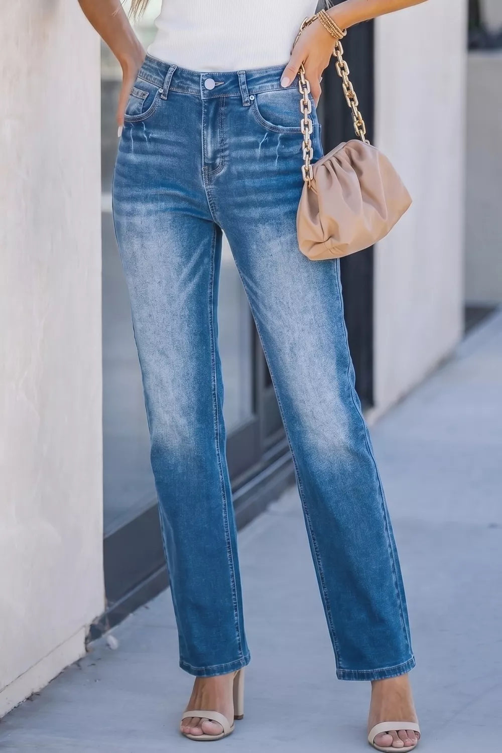 Acid wash straight leg mid rise stretch jeans