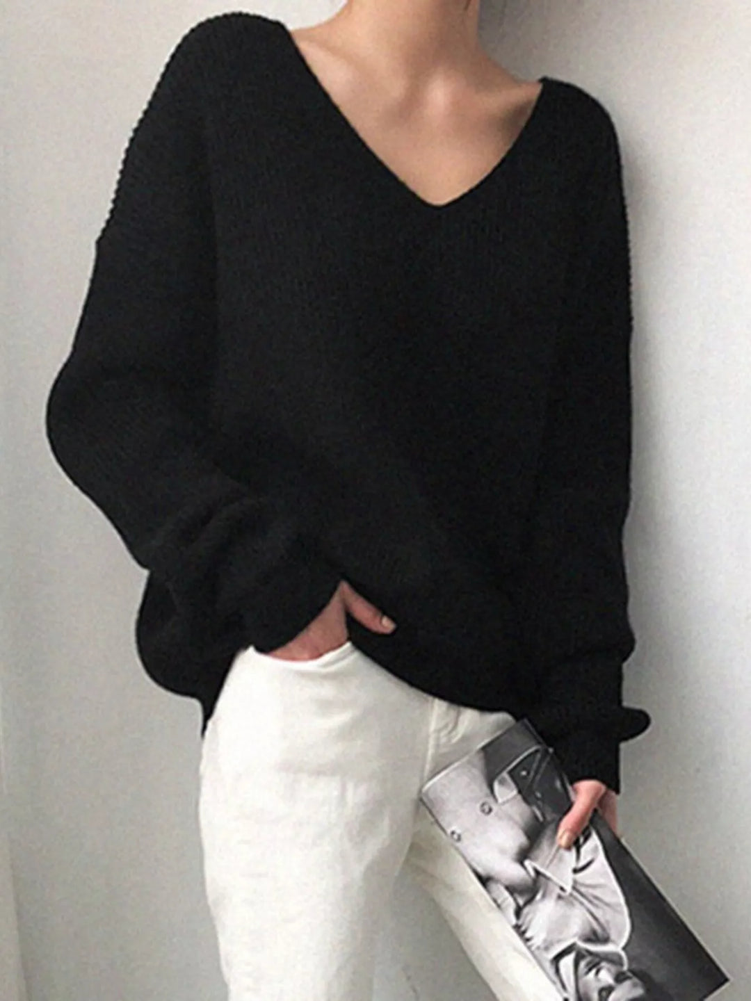 Black Ribbed knit V-neck sweater with dropped shoulders