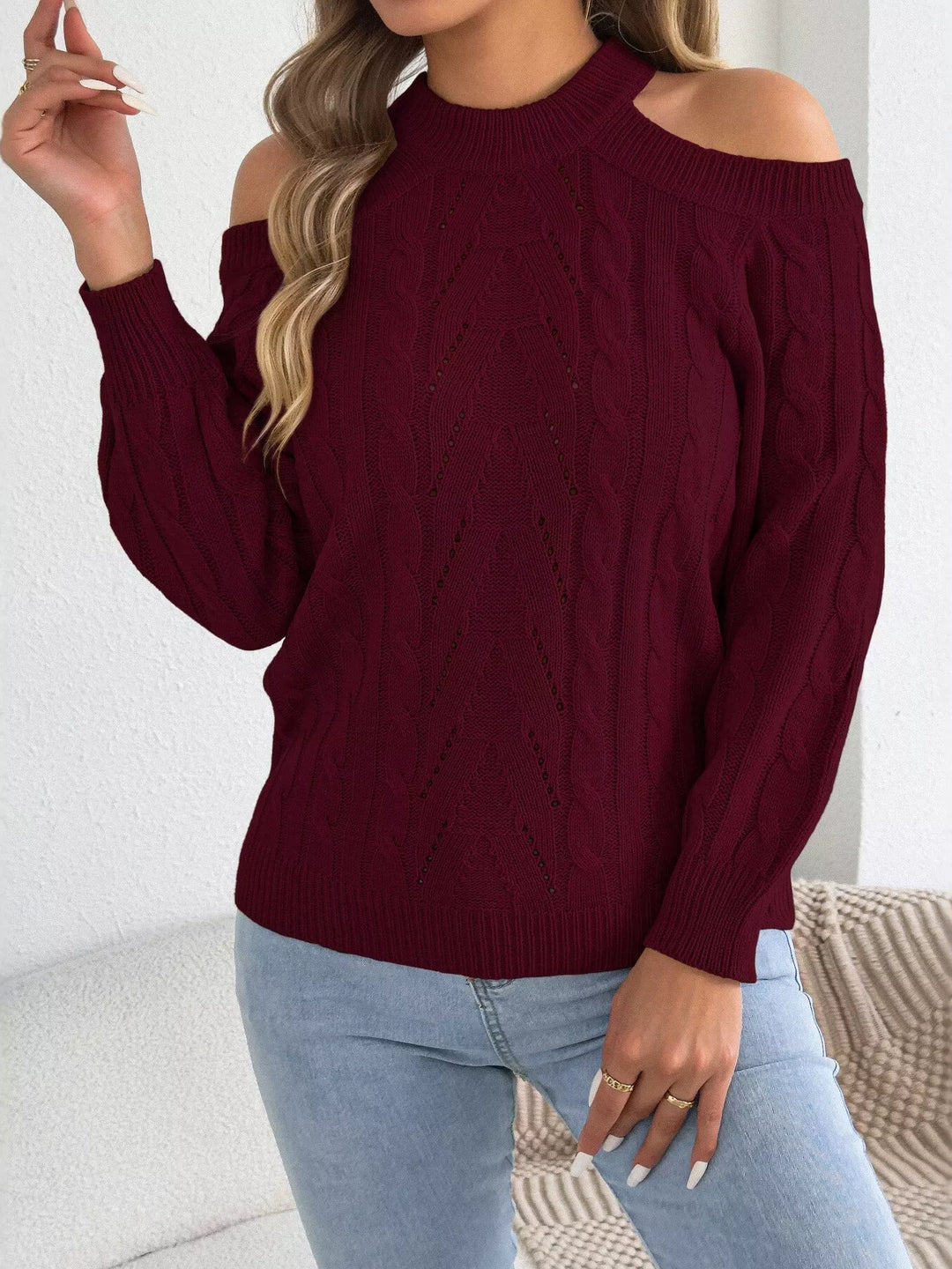 Cold shoulder cable knit mock neck sweater