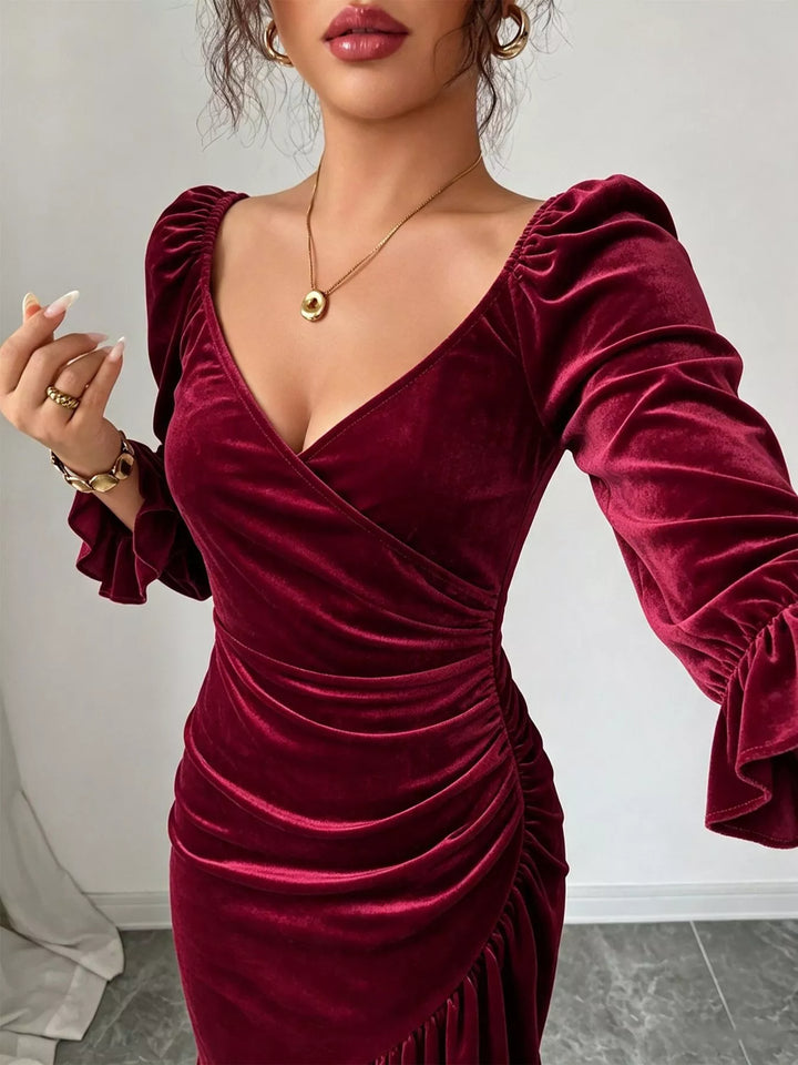 Ruched velvet midi dress with ruffle hem and flared cuffs