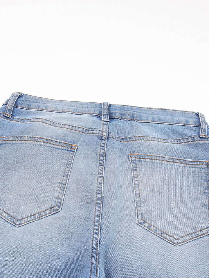High-rise whiskered wash raw hem cropped jeans