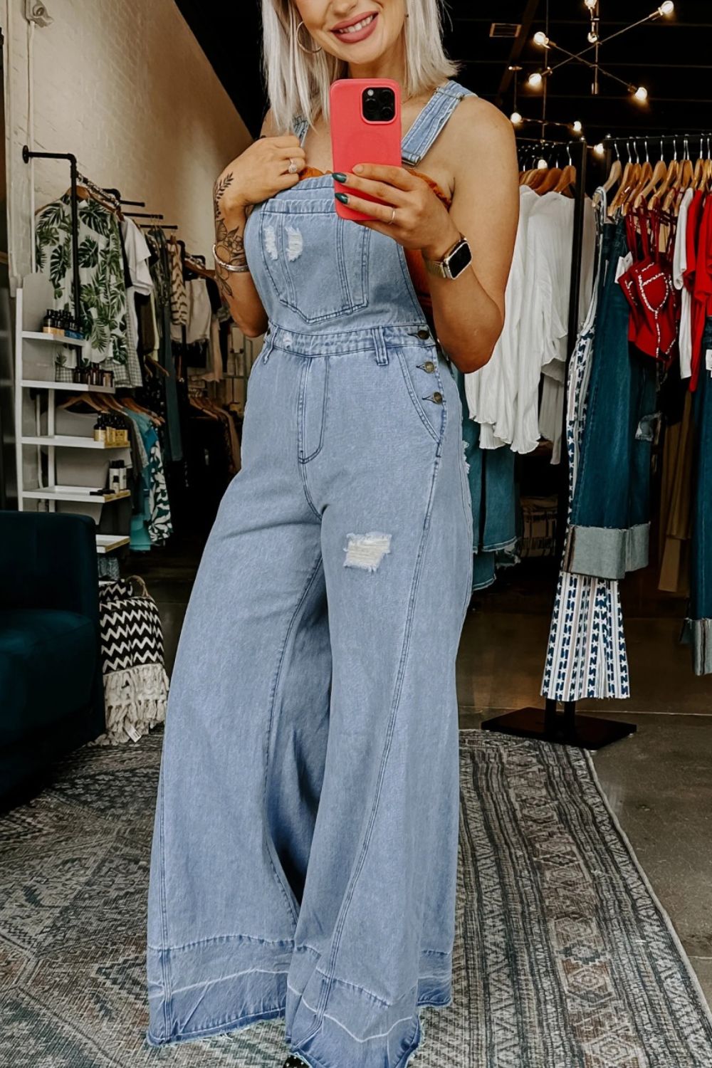 Light Blue Distressed wide-leg denim overalls with adjustable straps