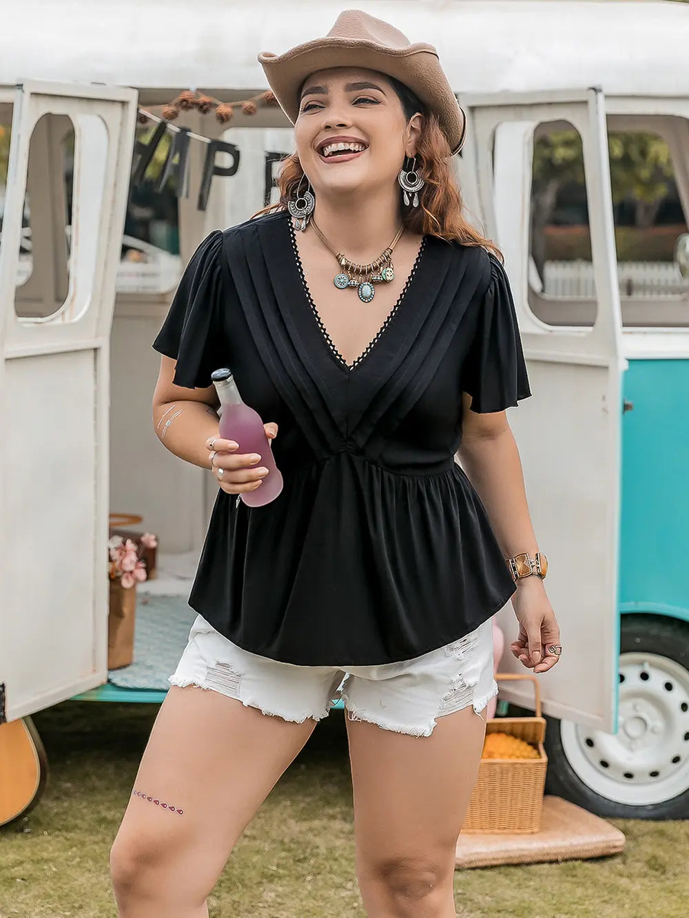 Plus size flutter sleeve V-neck peplum blouse