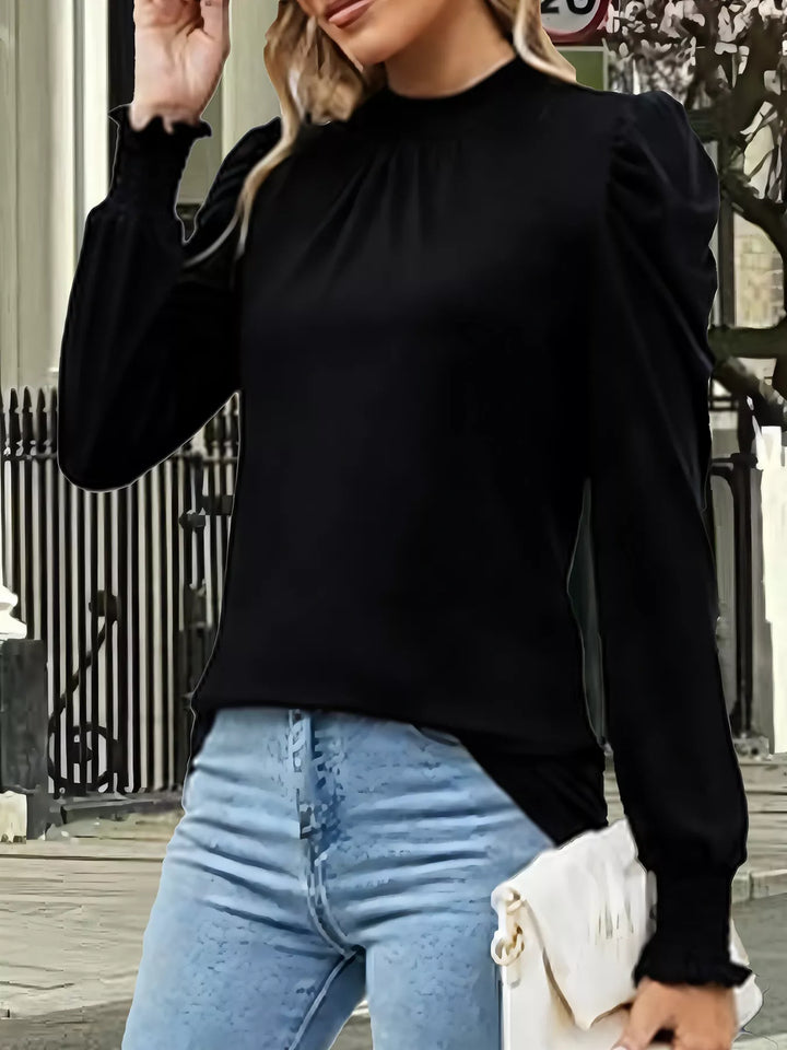 Mock neck puff sleeve blouse with smocked cuffs