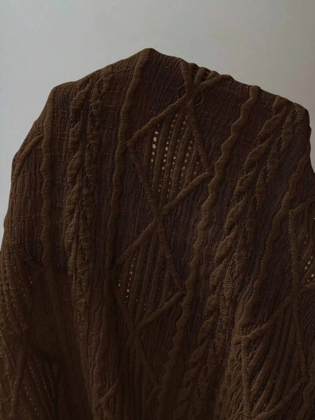 Textured diamond knit round neck top with cap sleeves