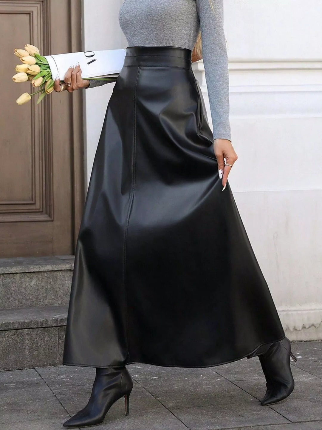 High-rise faux leather A-line midi skirt