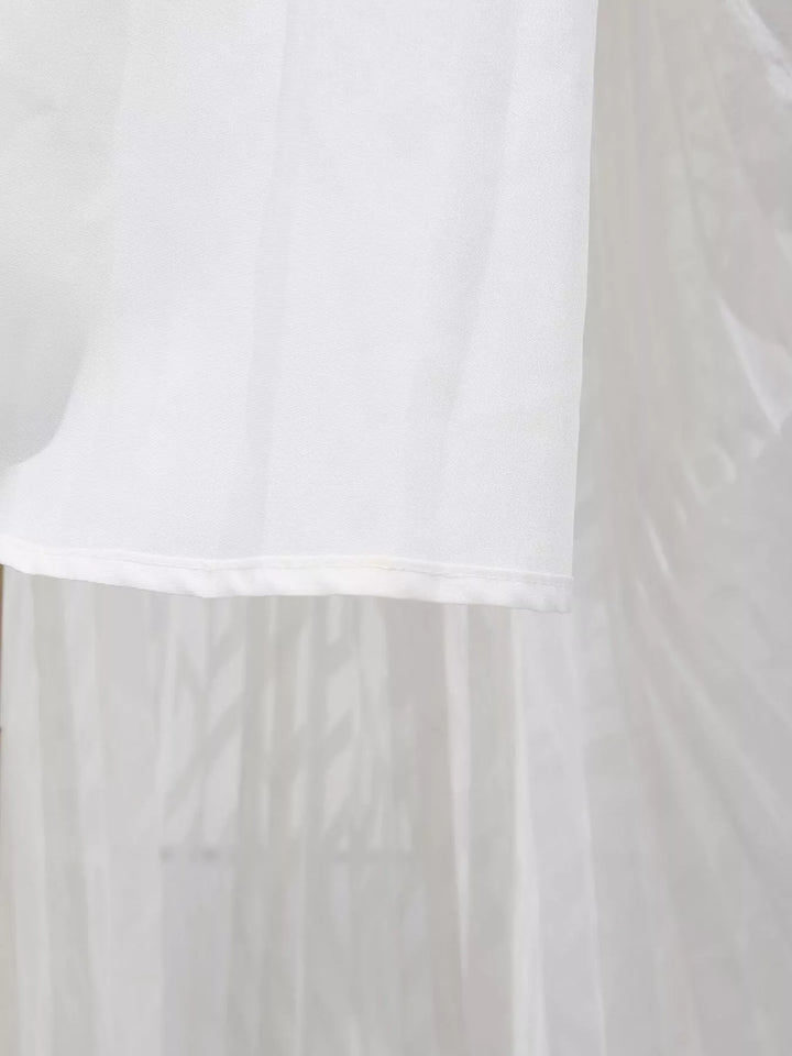 Textured V-neck balloon sleeve maxi dress with twist front