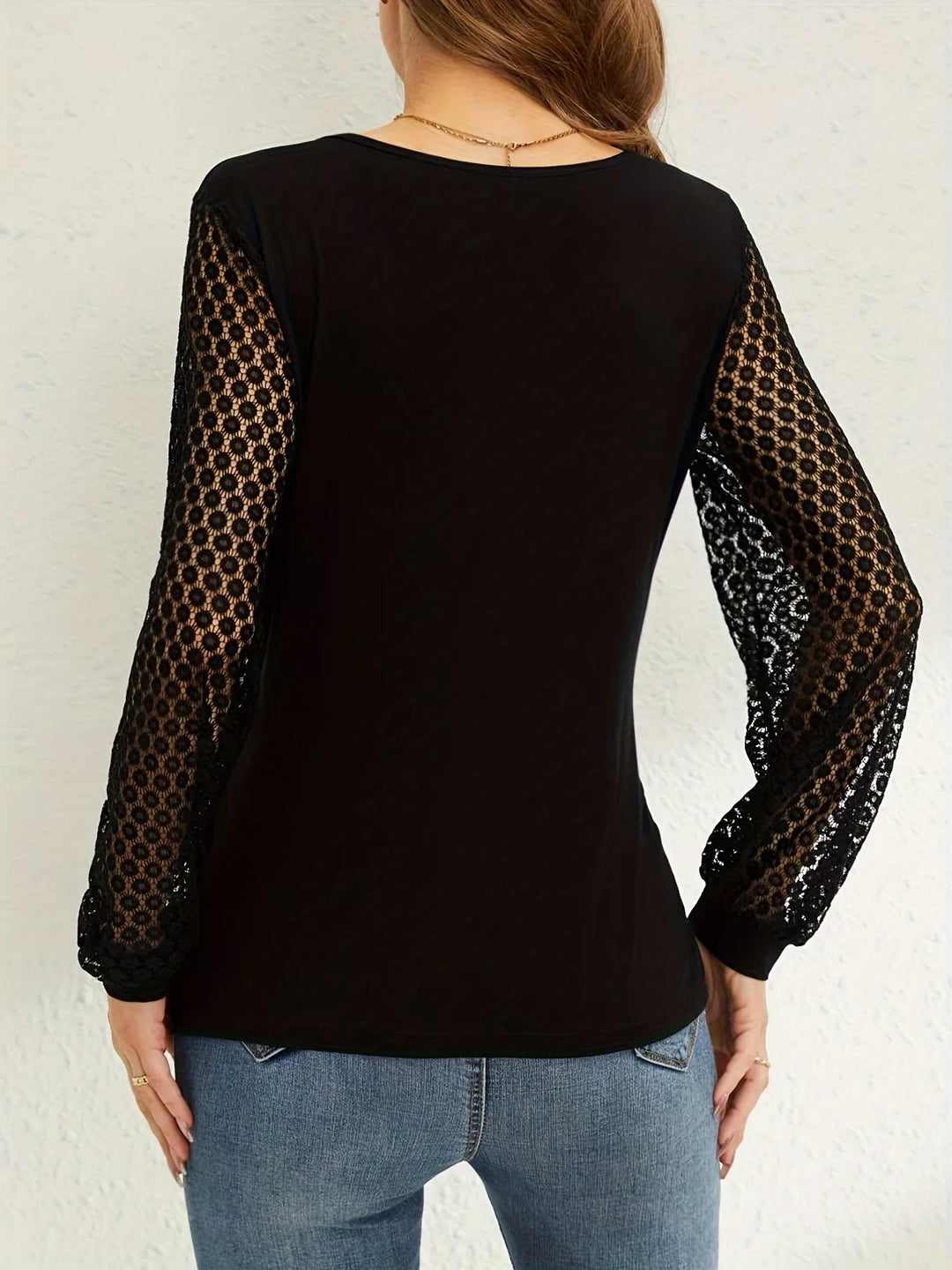 Wrap-front surplice top with sheer lace long sleeves