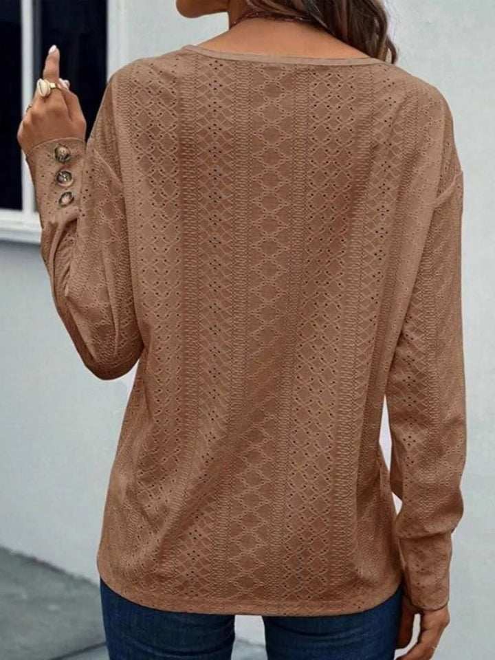 Eyelet V-neck long sleeve top with button cuffs