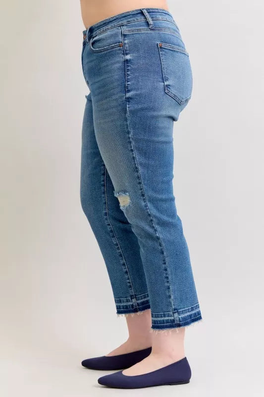 Distressed mid-rise boyfriend jeans with released raw hem