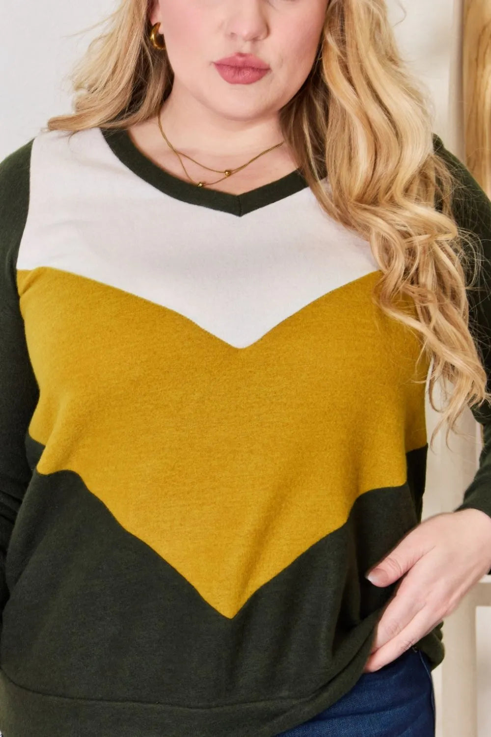 Color block chevron knit V-neck top with long sleeves