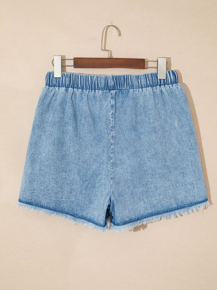 Drawstring denim shorts with raw hem and patch pockets
