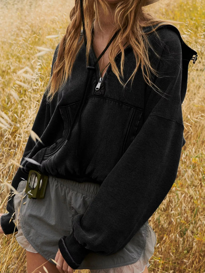 Half-zip hoodie with dropped shoulders and kangaroo pocket