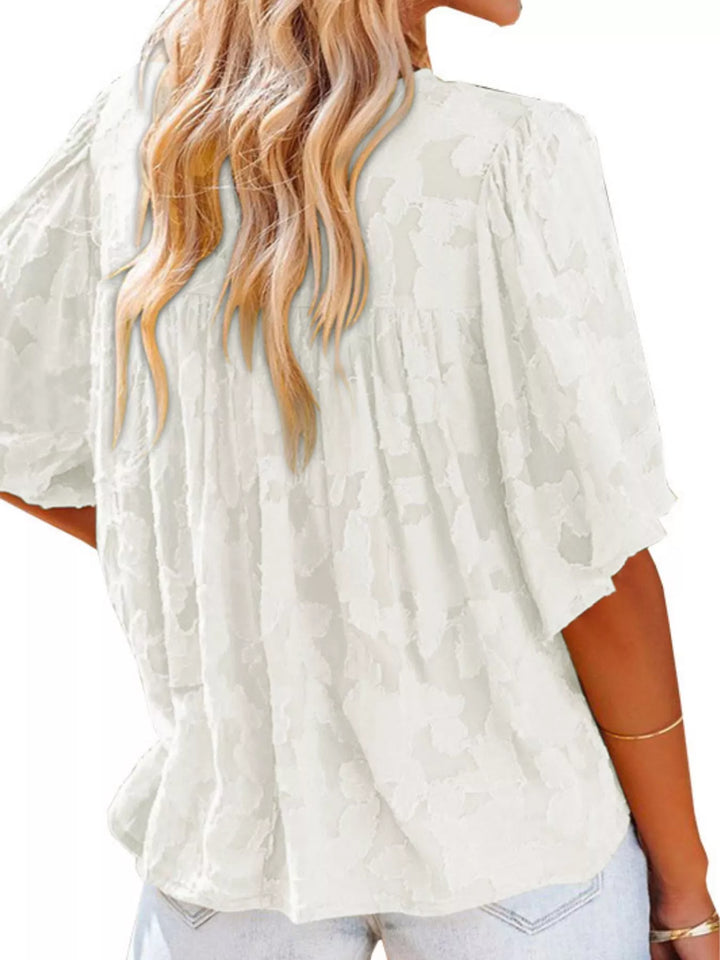Textured V-neck ruffle-trim button-down blouse