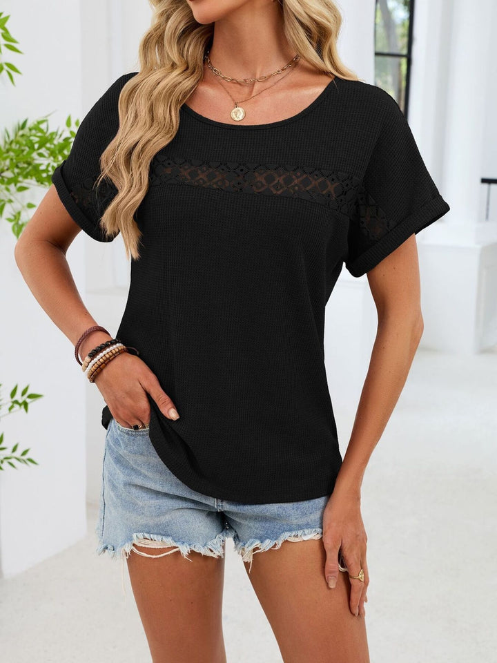 Waffle knit top with lace inset yoke and cuffed sleeves