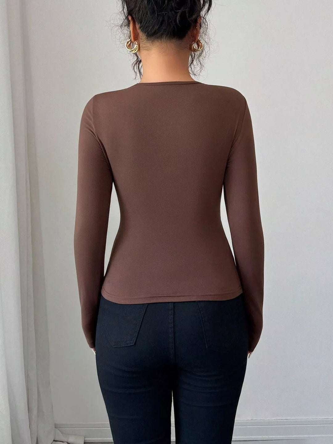 Twist front ring detail long sleeve top with cutout
