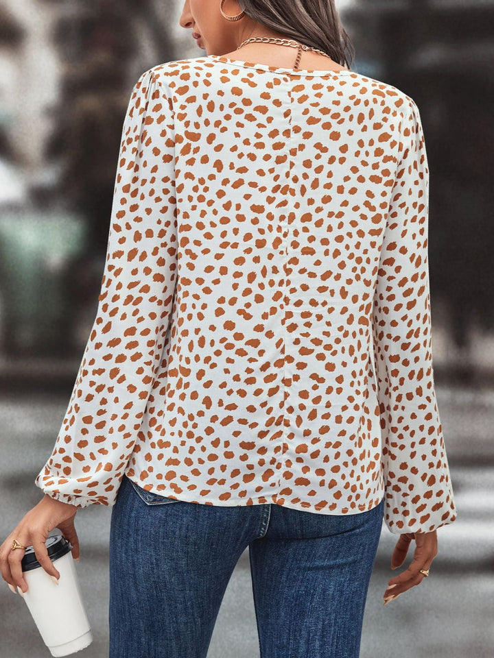 Floral print tie neck long sleeve blouse