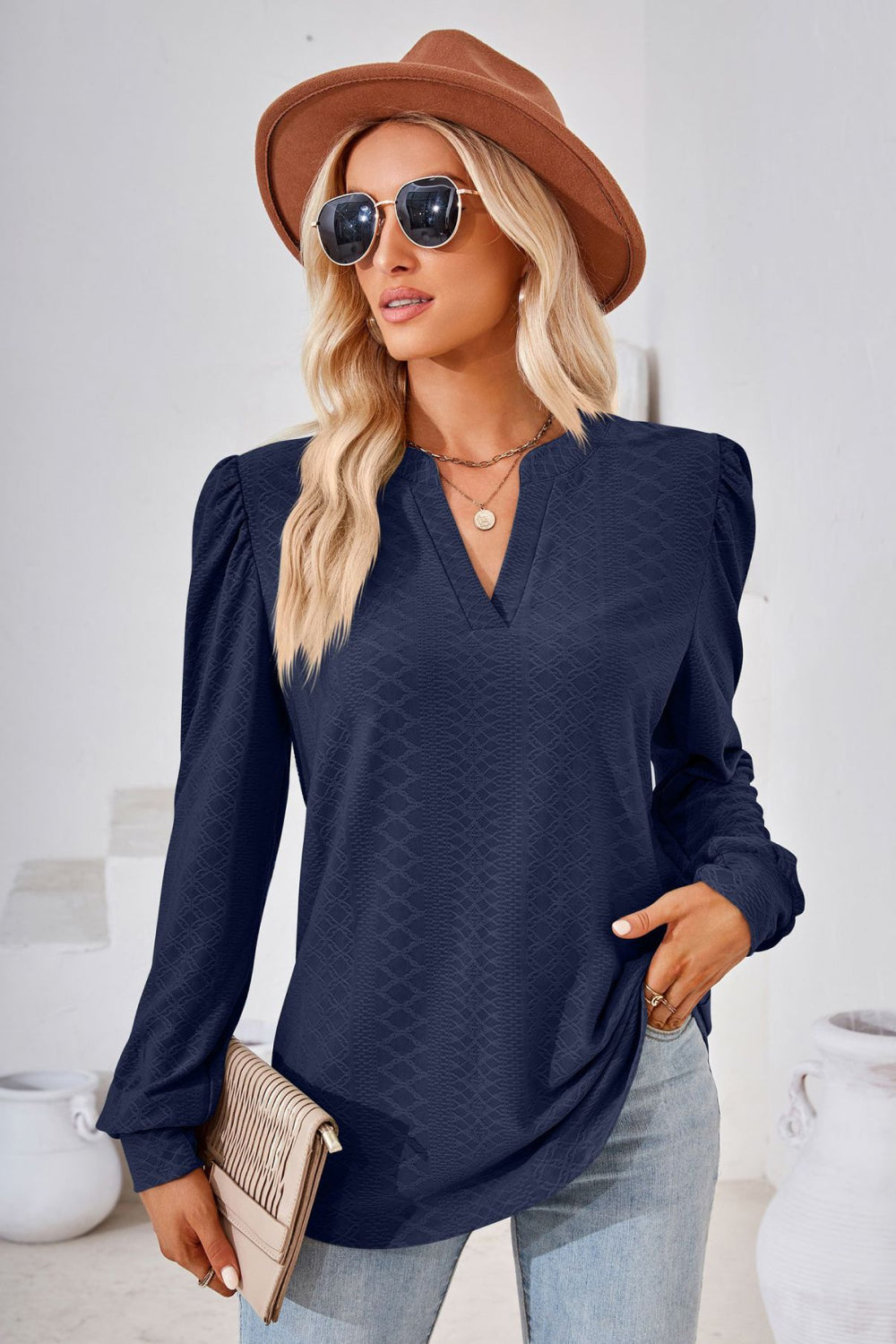 Textured knit split-neck puff sleeve blouse