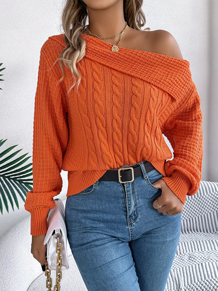 Cable knit one-shoulder sweater with fold-over ribbed collar