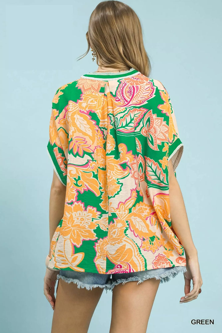 Oversized floral print top with V-neck and lace trim