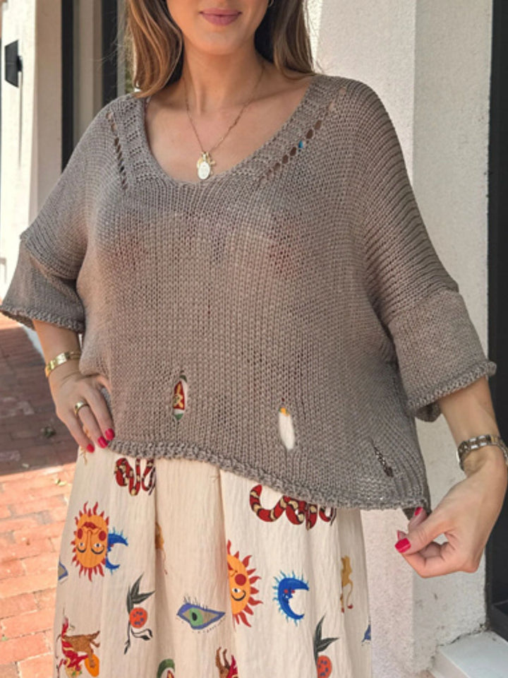Distressed open-knit V-neck sweater with 3/4 sleeves