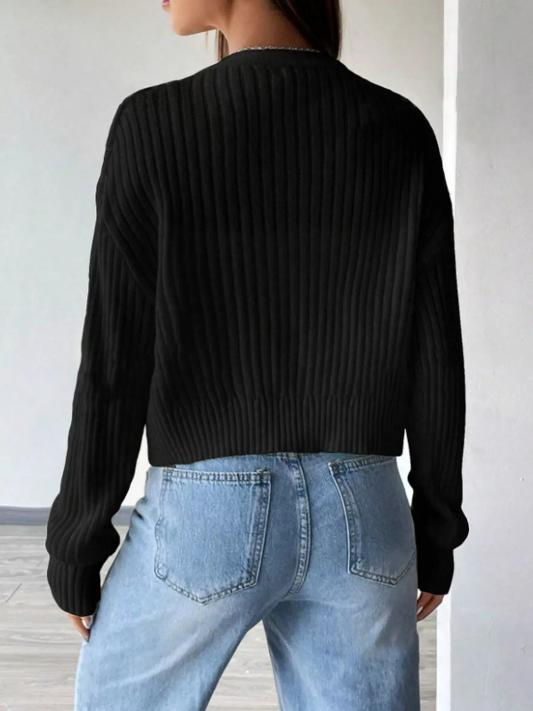 Ribbed knit V-neck button-up cardigan with drop shoulders
