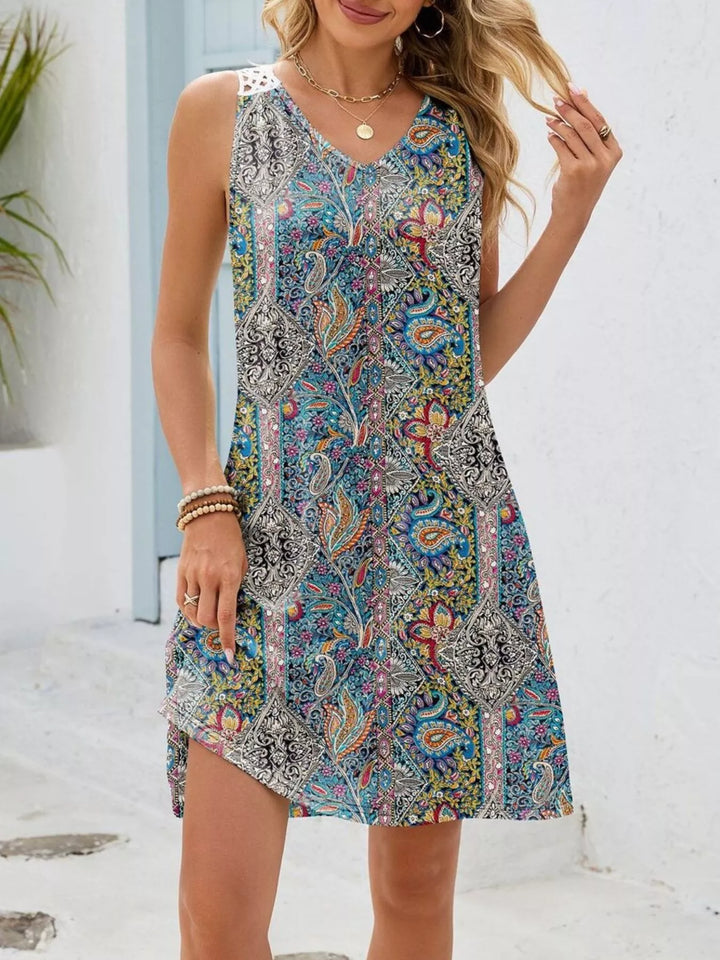 Watercolor floral mini dress with crochet cutout back