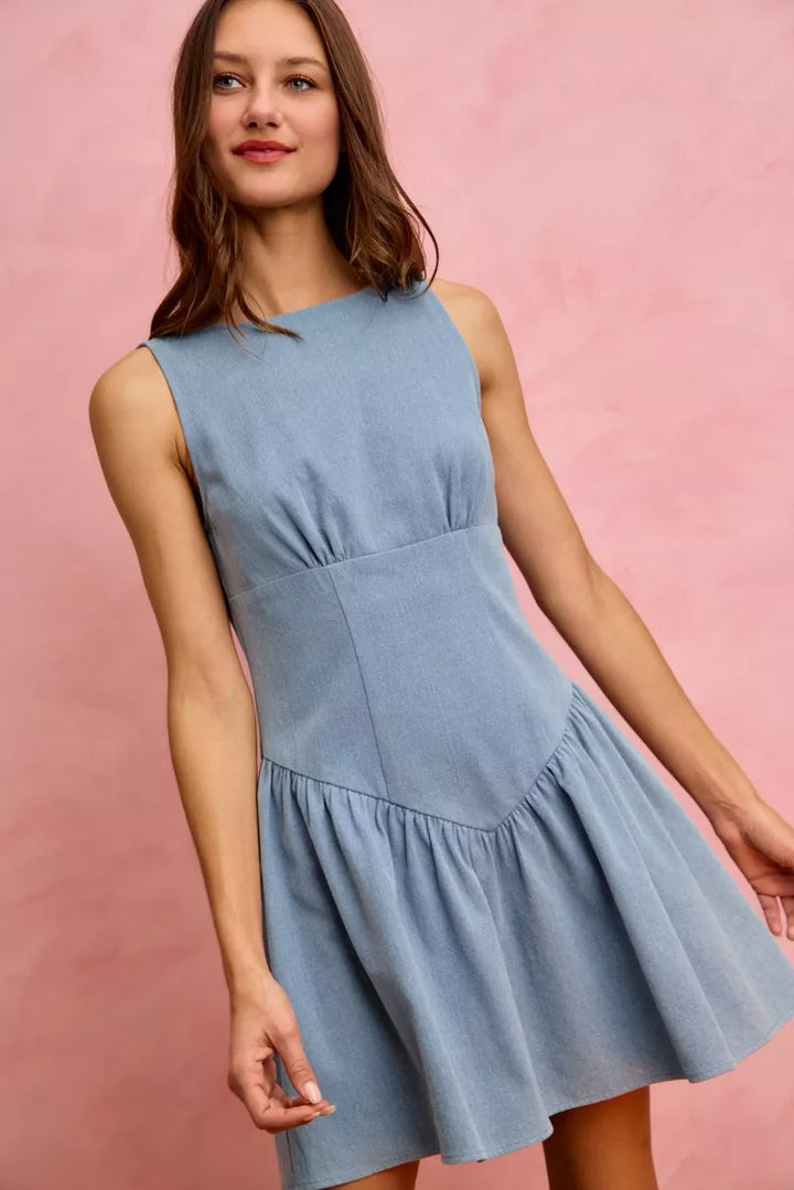 Sleeveless boat neck denim mini dress with flounce hem