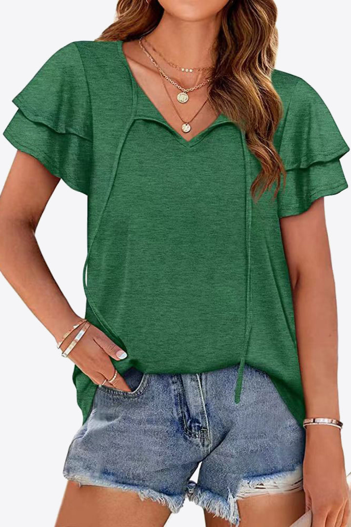 Forest Tiered flutter sleeve blouse with split tie neck