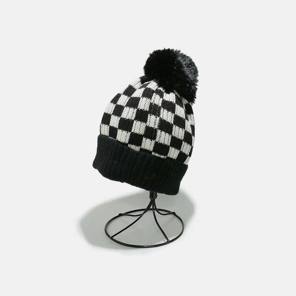 Black Checkerboard knit beanie with faux fur pompom