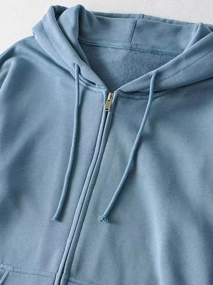 Oversized zip-up hoodie with drawstring hood and front pockets