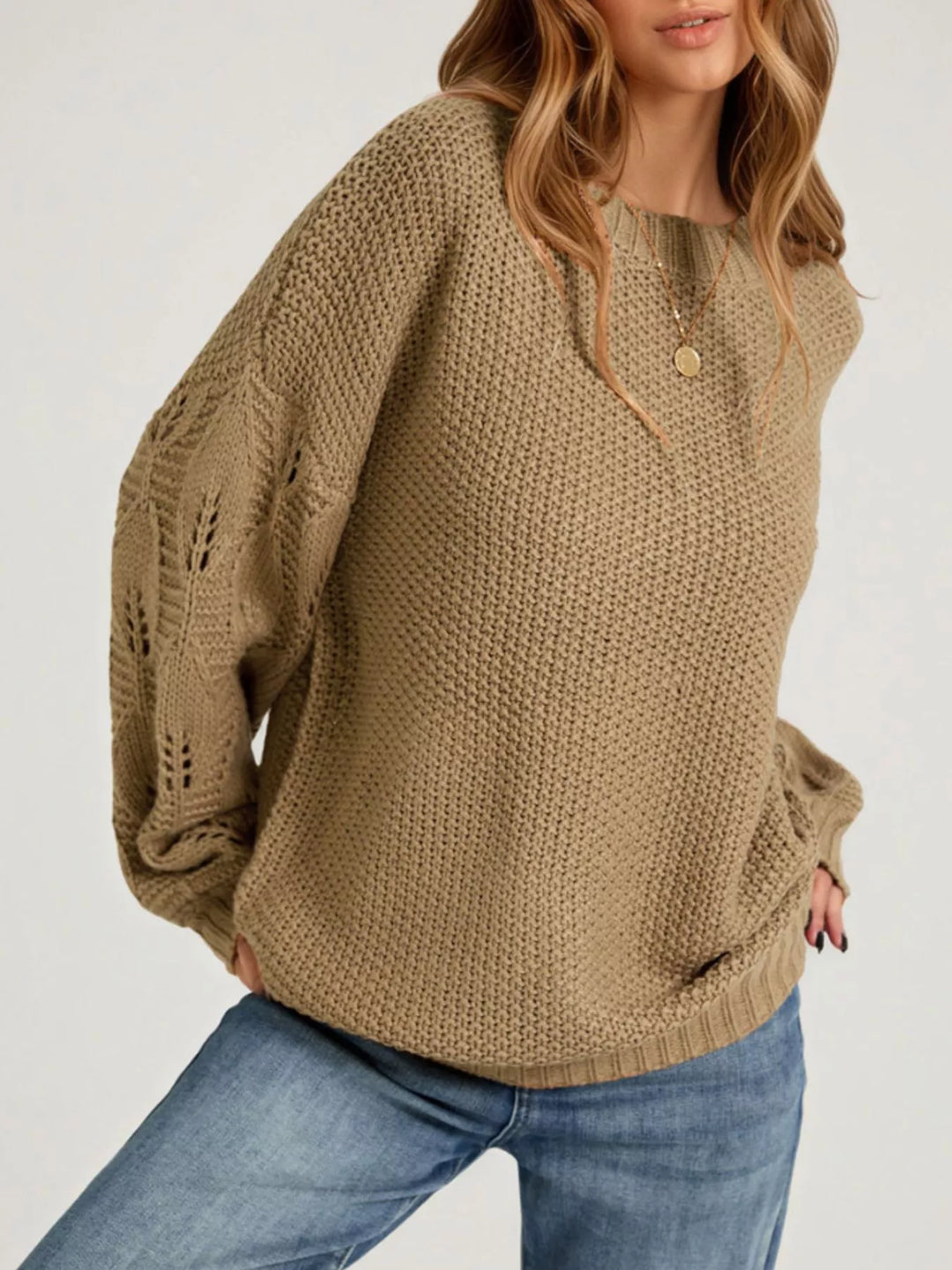 Openwork knit dropped shoulder sweater with curved hem